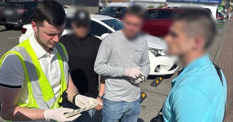 Хотів незаконно здати землю в оренду за $15 000: Нацполіція викрила посадовця КМДА